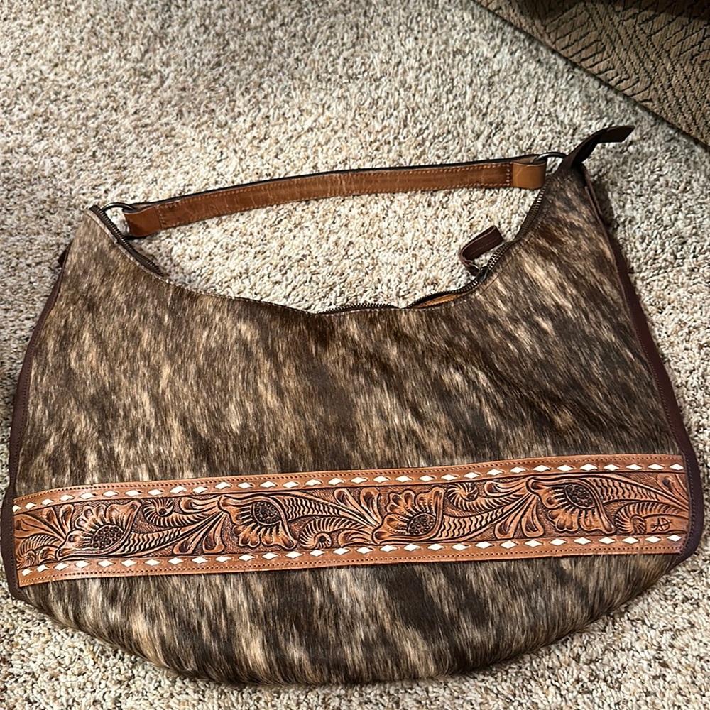 American darling cowhide purse never used